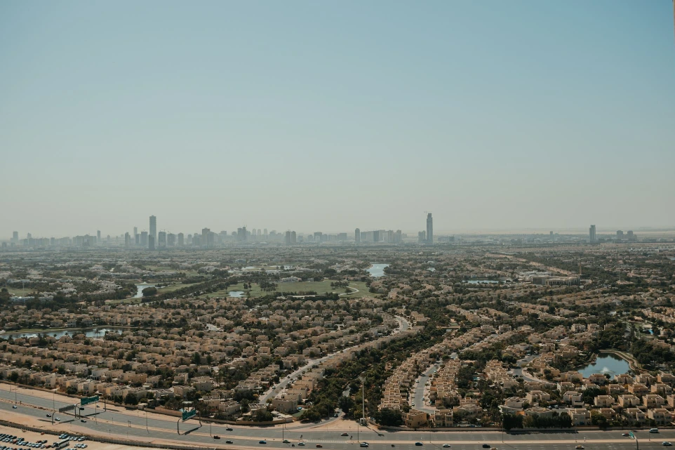 An aerial view of a city with lots of trees